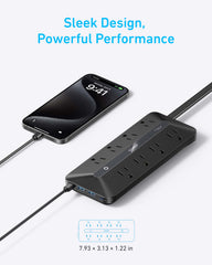 Anker regleta en uso sobre escritorio con laptop y móvil, reduce desorden