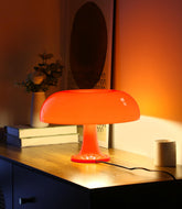 Anykonio lámpara hongo frontal mostrando forma y color naranja, ilumina cálidamente