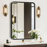 Atilioo front-facing matte black framed mirror showing sleek modern look and clear reflection