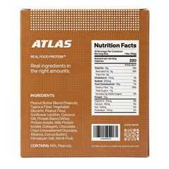 Corte cercano de textura interior de Atlas Protein Bar con miga densa y masticable