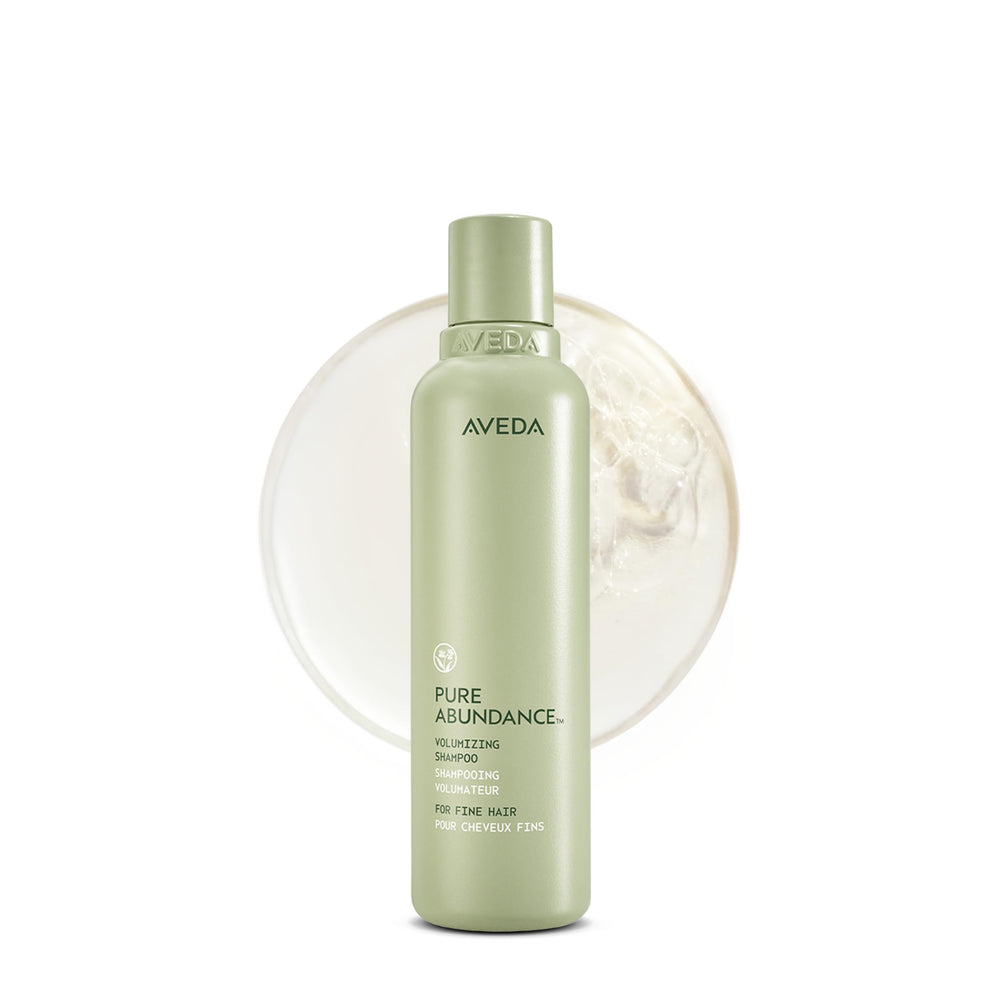 Aveda champú frontal muestra botella y diseño, transmite confianza de marca