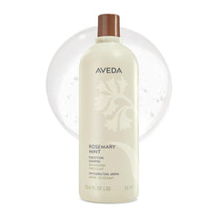 Aveda botella frontal grande mostrando fórmula purificante y beneficio de limpieza