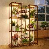 Bamworld front view plant stand showing tiered pots and warm light, enhances display