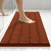 Bcoimo vista frontal de la alfombra mostrando color naranja quemado y forma compacta