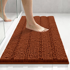 Bcoimo vista frontal de la alfombra mostrando color naranja quemado y forma compacta