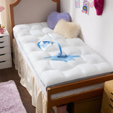 Bedsure vista frontal del topper Twin XL empacado, protección y confort inmediato