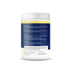 Bella All Natural vaso con polvo detox piña preparado, bebida refrescante y lista