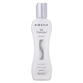 BioSilk botella frontal mostrando etiqueta y beneficio de brillo