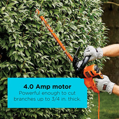 BLACK+DECKER recortando un seto uso en jardín para perfilar arbustos rápidamente