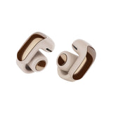 Bose Ultra Open Earbuds frontal en Driftwood Sand mostrando diseño y comodidad