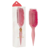 Bounce Curl cepillo frontal Raspberry mostrando forma ergonómica y beneficio de volumen