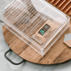 Boveda sobre detalle textura y sello, marca Boveda protege aromas