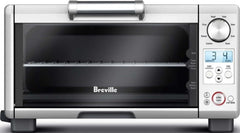 Breville BOV450XL vista frontal en acero inoxidable, diseño compacto beneficioso