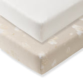 Burt's Bees Baby empaque frontal mostrando sábana ajustable y beneficios