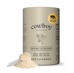 COWBOY COLOSTRUM frasco frontal mostrando el envase y beneficio de pureza