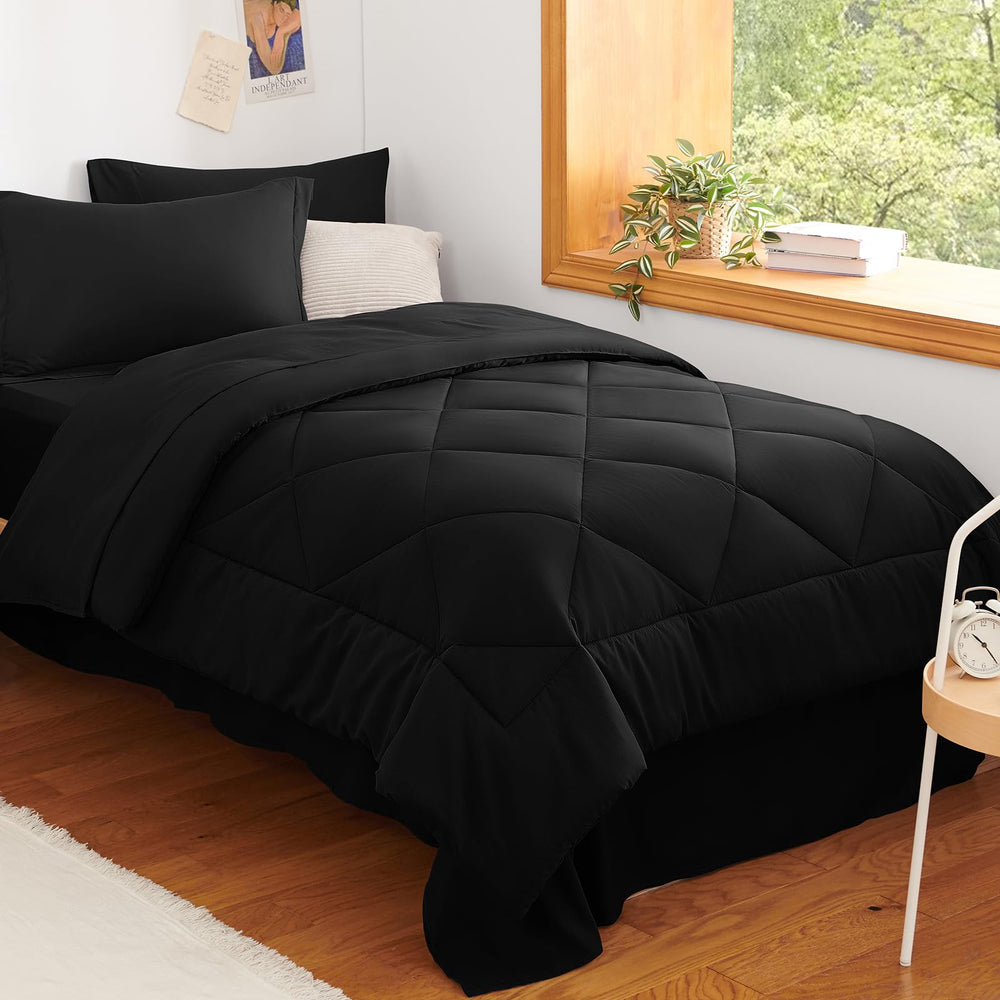 CozyLux edredón frontal negro mostrando estilo y calidez práctica
