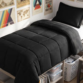 CozyLux edredón frontal negro mostrando acabado y beneficio estética moderna