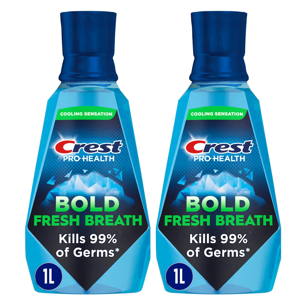 Crest botella frontal 1 L mostrando la marca y beneficio antiplaca
