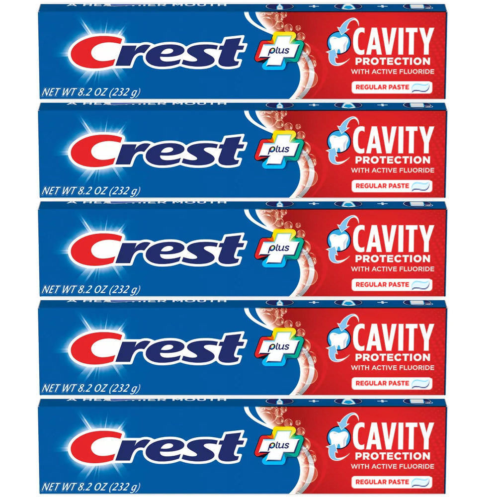 Crest tubo frente mostrando marca y tamaño 8.2 oz, protección anticaries