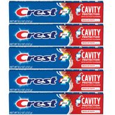Crest tubo frente mostrando marca y tamaño 8.2 oz, protección anticaries