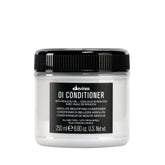Davines OI acondicionador frontal muestra el envase y beneficio de brillo