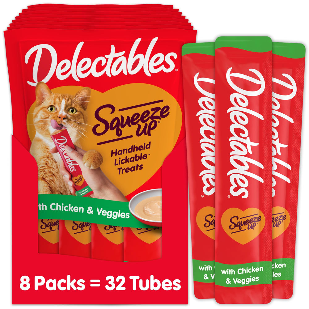 Delectables tubo frontal mostrando puré de pollo y verduras, atrae al gato