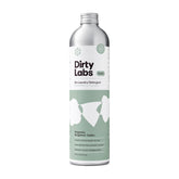 Dirty Labs botella frontal mostrando etiqueta y aroma signature