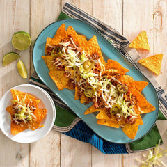 Doritos Cool Ranch chip close-up highlighting herby seasoning and tangy flavor boost