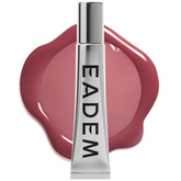 EADEM frasco frente mostrando diseño y tono Fig Sauce, acabado elegante
