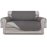Easy-Going front view of gray couch cover fitted neatly, protecting sofa from stains