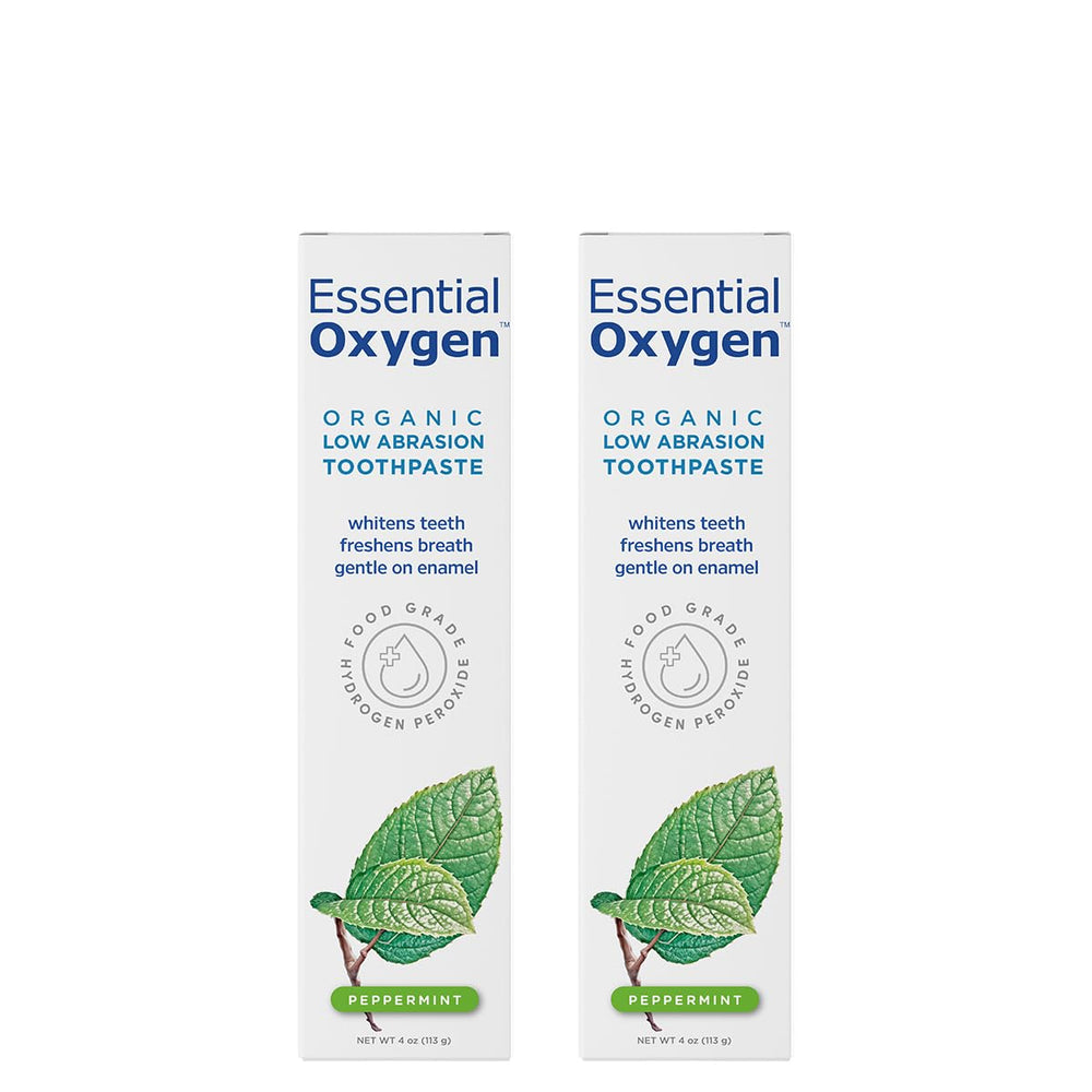 Essential Oxygen frente del tubo mostrando etiqueta orgánica y beneficio de blanqueo