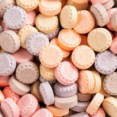 Ferrara Wonka primer plano de tabletas mostrando textura crocante y brillo