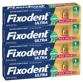 Fixodent frontal del pack mostrando Ultra Max Hold y Plus Scope para seguridad
