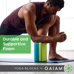 Gaiam bloques en uso bajo cadera para meditación más cómoda