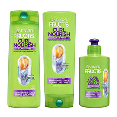 Garnier Fructis kit frontal mostrando champú acondicionador y crema, rutina completa