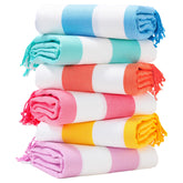 Genovega toalla frontal empacada mostrando rayas y color, comodidad inmediata