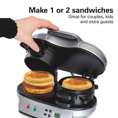 Hamilton Beach open view with two hot assembled breakfast sandwiches ready to eat