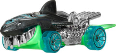 Hot Wheels Monster Trucks Great Bite y Rageasaur en salto demostrando acción y suspensión