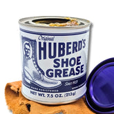 Huberd Shoe Grease frasco frontal mostrando la presentación y confianza