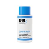 K18 envase frontal del acondicionador que muestra el diseño y protege el cabello
