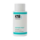 K18 envase frontal del champú prep detox mostrando volumen y fórmula segura para color