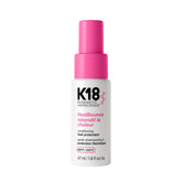 K18 envase frontal mostrando el spray y beneficios inmediatos