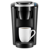 Keurig K-Compact vista frontal mostrando diseño compacto y rapidez