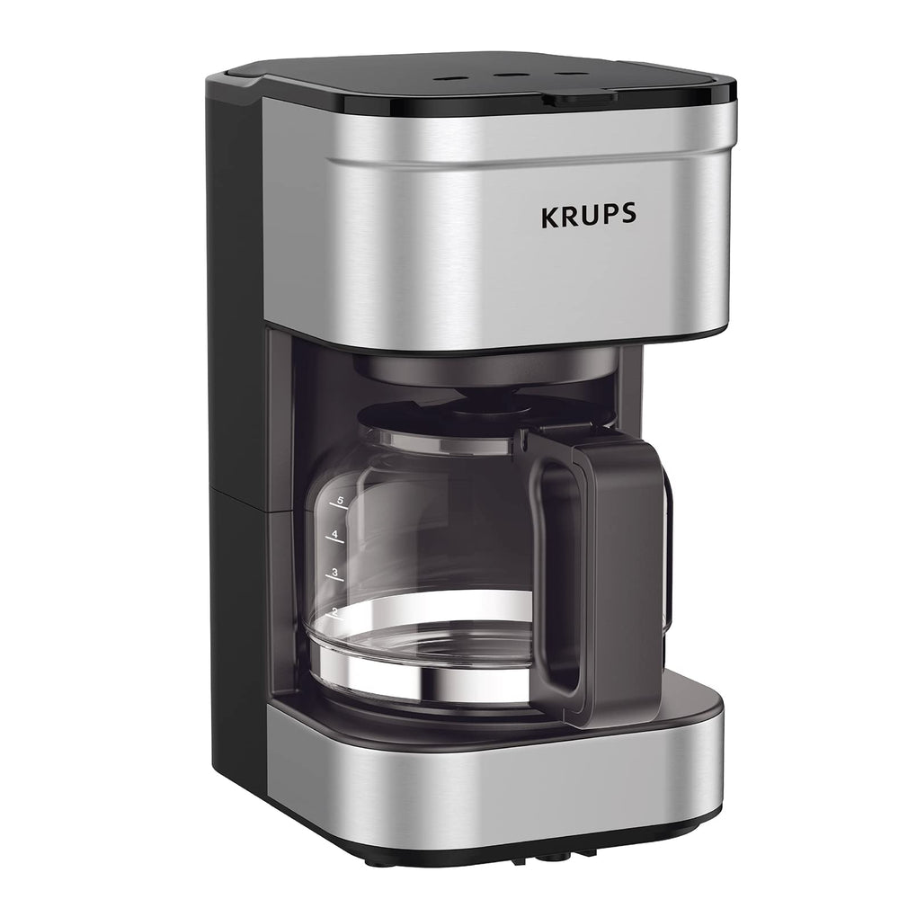KRUPS vista frontal de la cafetera compacta con acabado inoxidable y control simple
