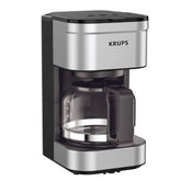 KRUPS vista frontal de la cafetera compacta con acabado inoxidable y control simple