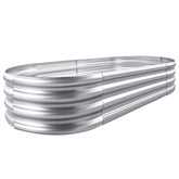 Land Guard front view of oval galvanized raised garden bed showing clean modern finish and durability