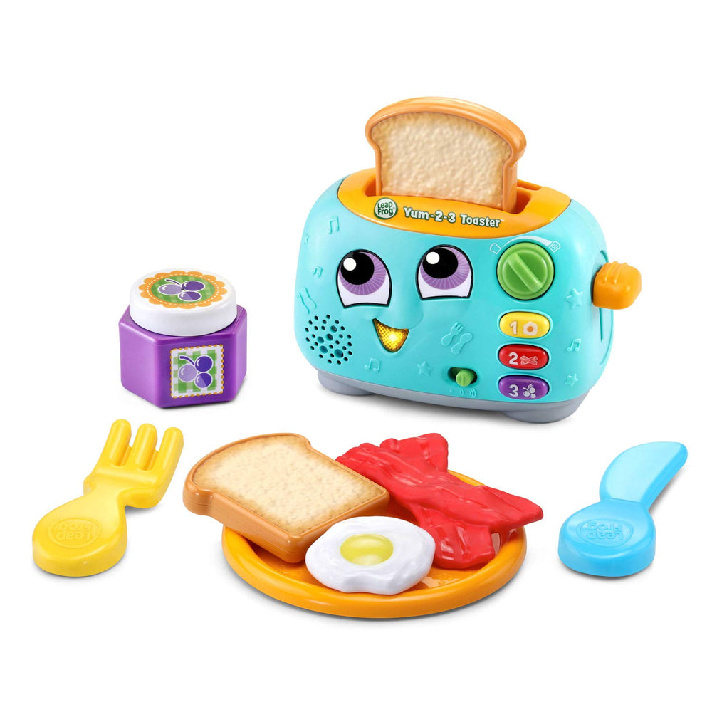 LeapFrog tostadora frontal mostrando botones y ranuras, aprendizaje inmediato