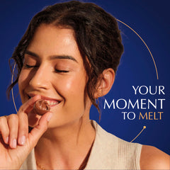 Lindt LINDOR trufa cortada mostrando centro cremoso y contraste de cáscara