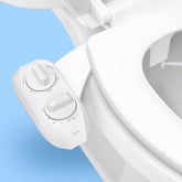 LUXE Bidet NEO 185 PLUS frontal mostrando diseño compacto y limpieza mejorada