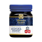 Manuka Health frasco frontal mostrando etiqueta UMF 13+ y MGO 400+ beneficio autenticidad